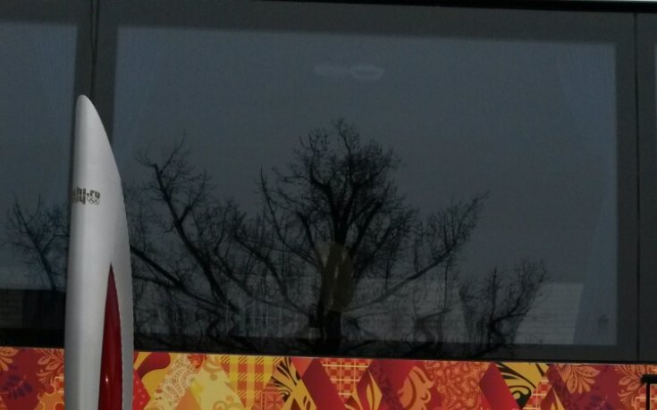 Генералният секретар на БОК бяга с олимпийския огън за Сочи