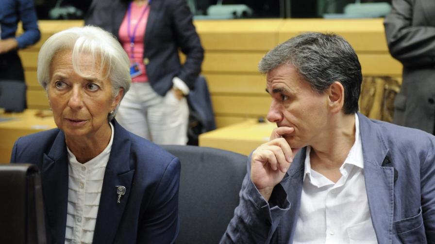 Шефът на МВФ Кристин Лагард и гръцкият финансов министър Евклидис Цакалотос