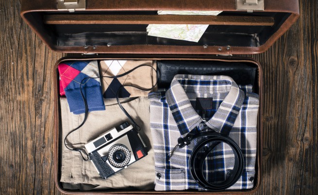 Страшно хитро: Много багаж в малък куфар (видео)