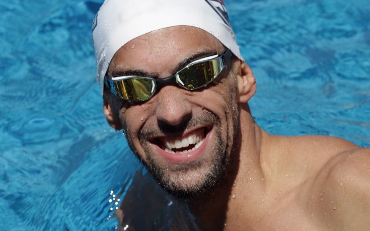 Фелпс знаменосец за САЩ на откриването на Олимпиадата