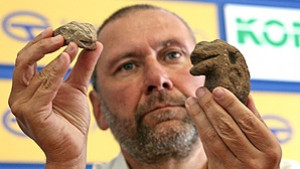 Глава на кобра от III I в е сред последните