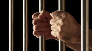 В затвора само защото е християнин