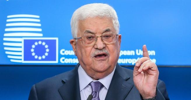 Американски и израелски служители порицаха днес палестинския президент Махмуд Абас