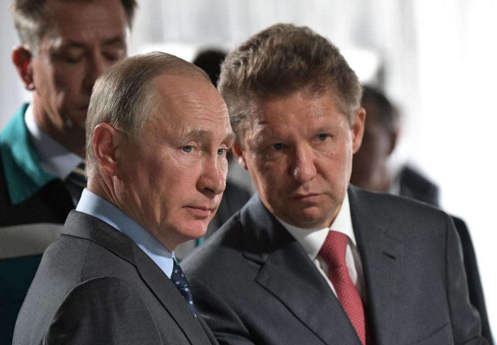 Главният изпълнителен директор на Газпром Алексей Милер и руският президент Владимир Путин