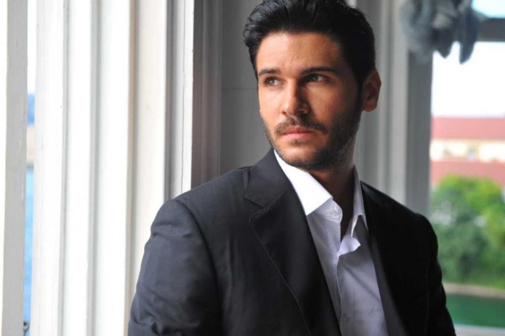  Толгахан Сайъшман 