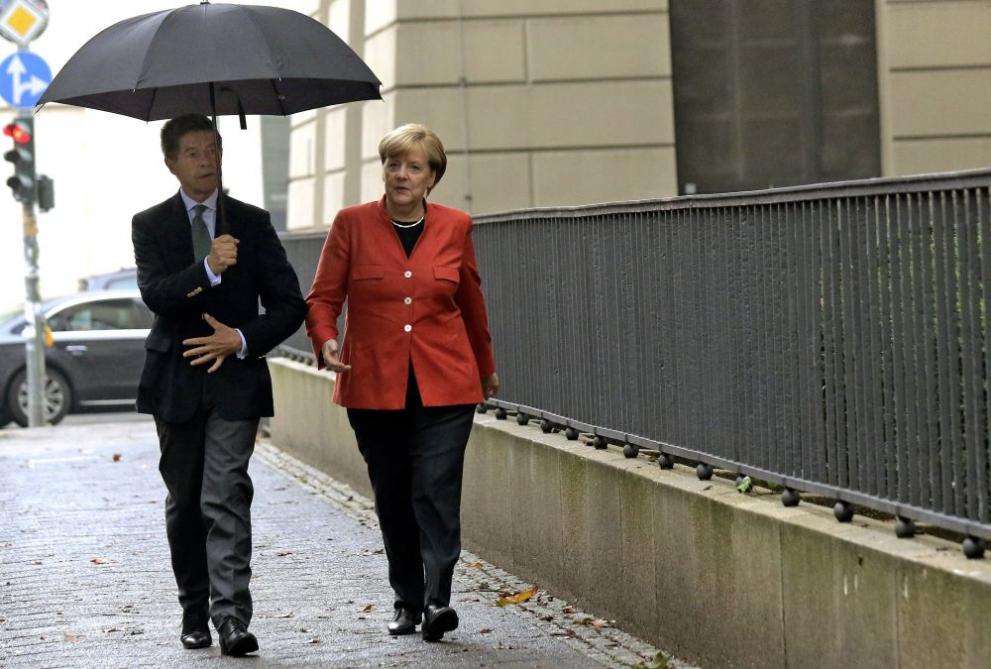  Меркел със брачна половинка си 