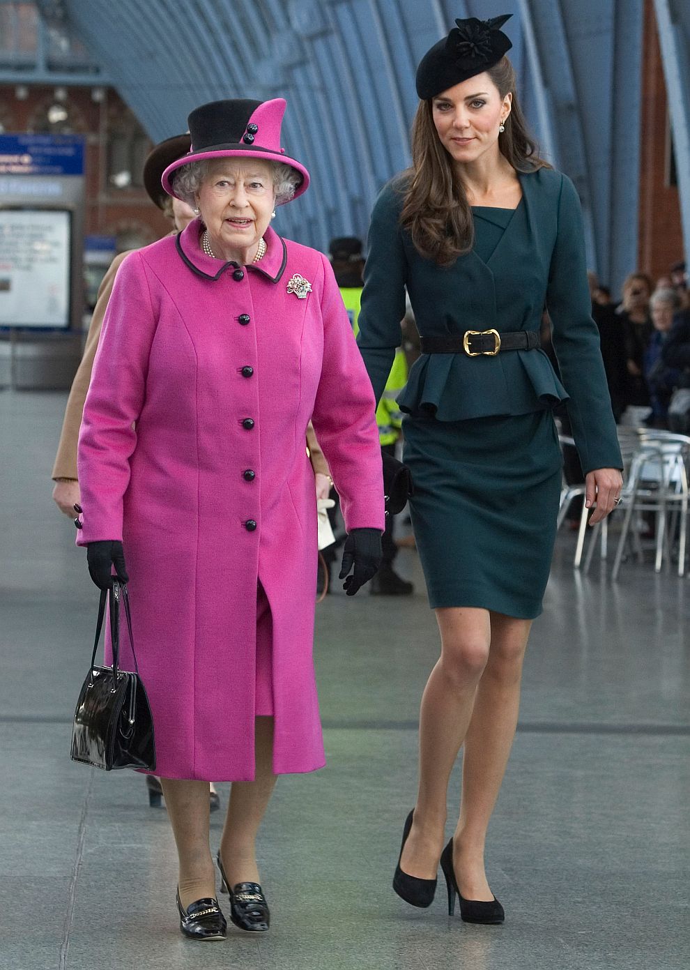 Първият ангажимент на Кейт с Елизабет Втора бе на 8 март 2012 година. Двете заедно със съпруга на кралицата – принц Филип, посетиха Лестър. Кейт избра за появата си син костюм на британския бранд L K Bennett. 
