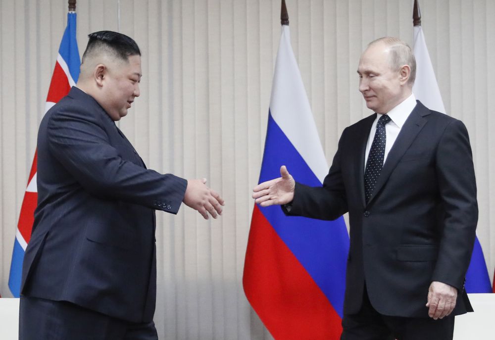 Владимир Путин и Ким Чен ун