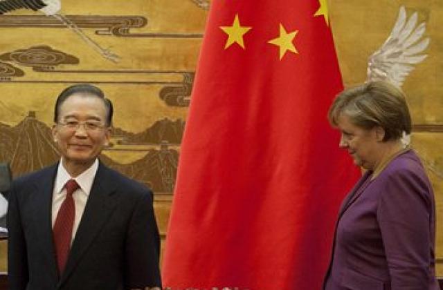 Меркел натисна Китай за помощ