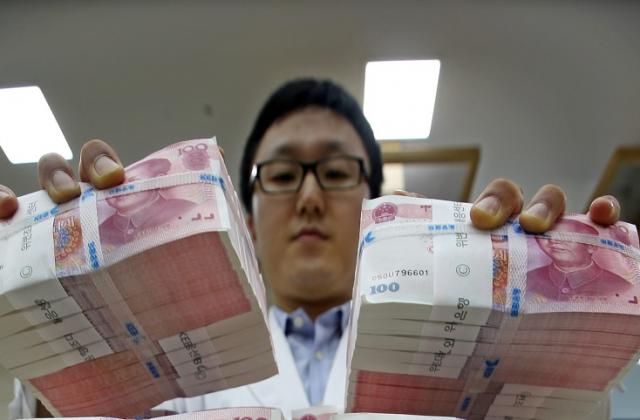 Китай се готви за скок на долара