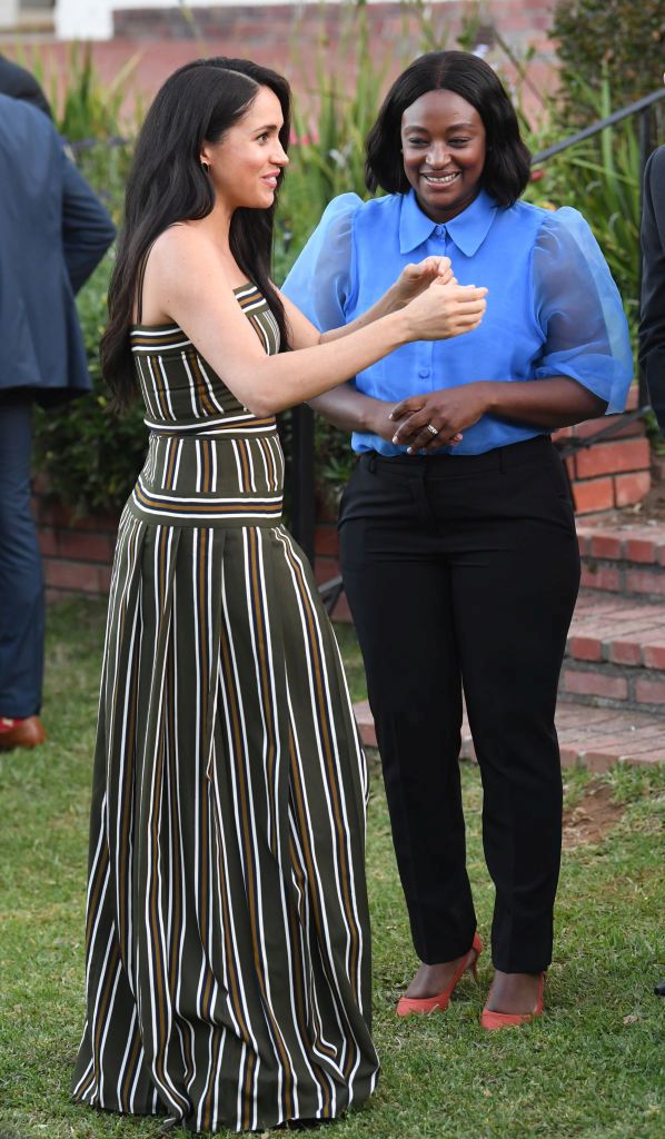 Тоалетите, които Меган носеше по време на визитата в Африка