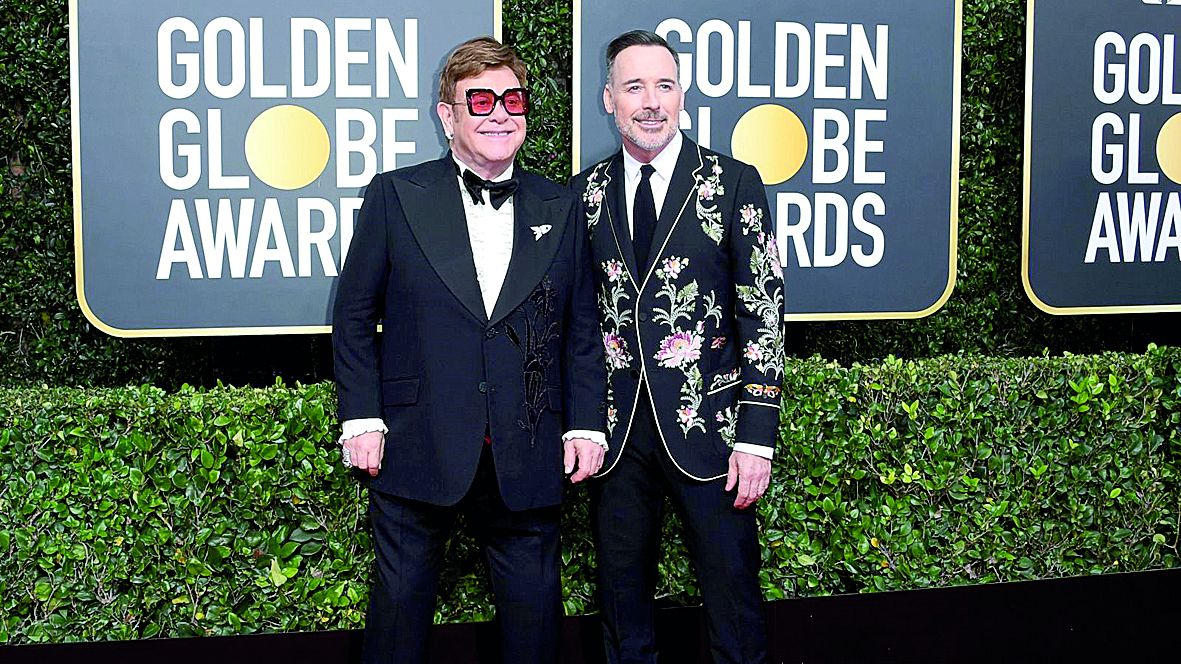 Елтън Джон сключи сделка с бившата си