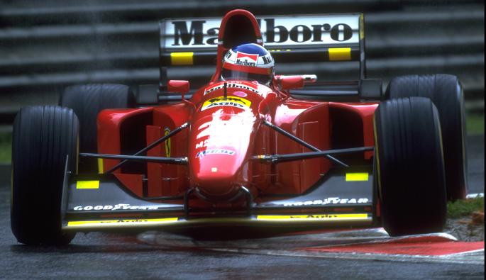 Жан Алези със своето Ferrari по време на мократа квалификация за GP на Белгия през 1994 г.