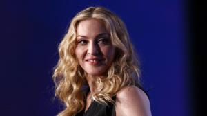 Мадона излиза с 29 годишния боксьор Джош Попър съобщи Daily