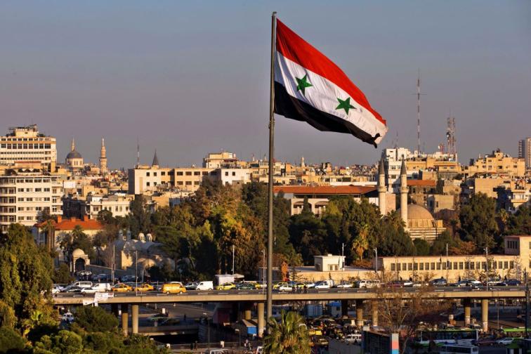 Националният флаг на Сирия се развява в столицата Дамаск