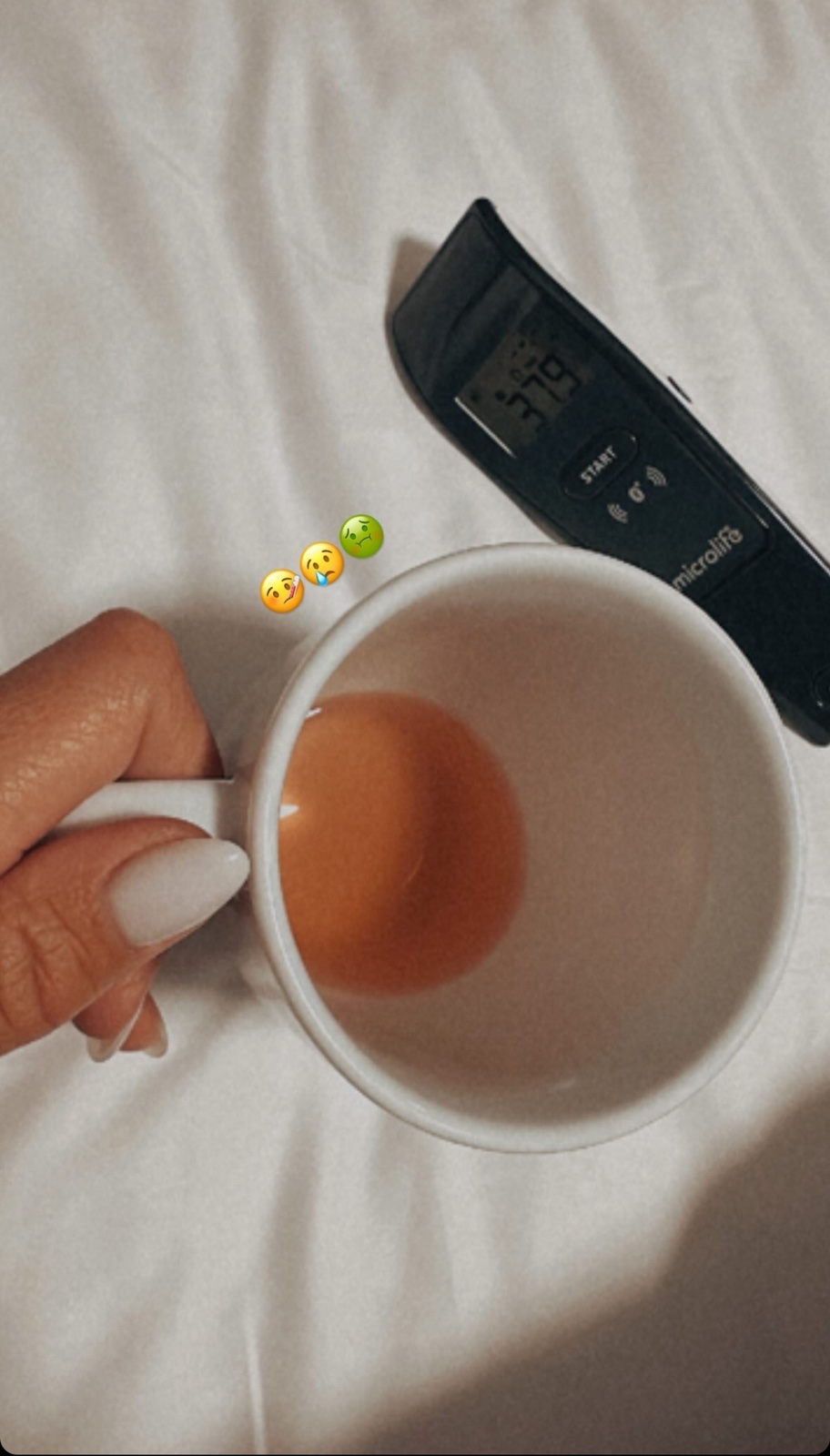 температура