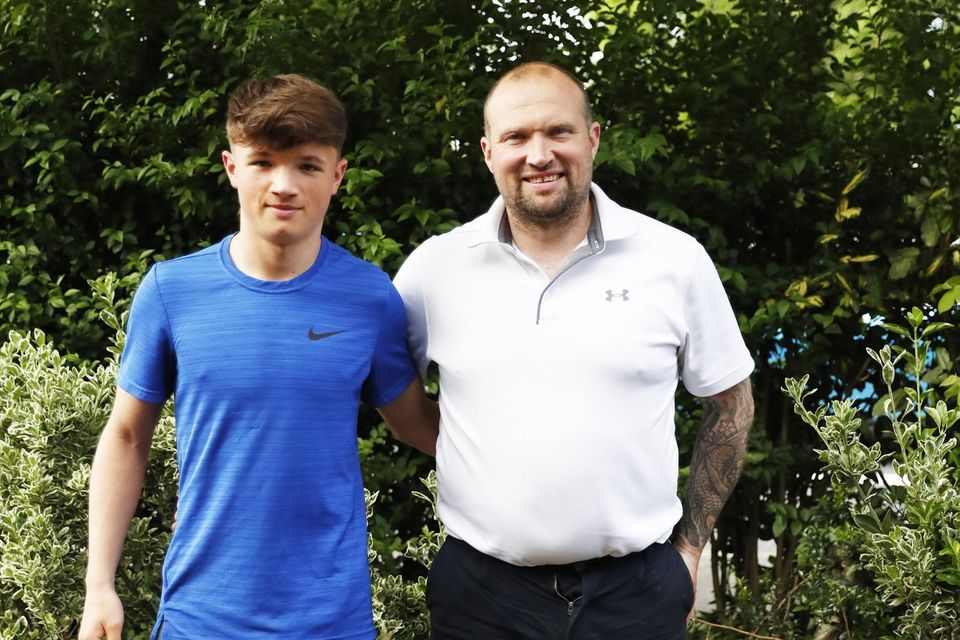 Джордж с баща си Уорън Фийни