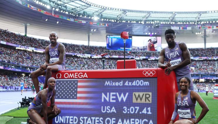 САЩ щафета 4х400 - Американски пай на смесената щафета 4х400 метра. Янките подобриха собствения си световен рекорд