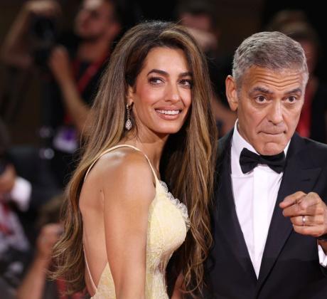 Холивудската двойка Амал и Джордж Клуни заедно с осемгодишните си