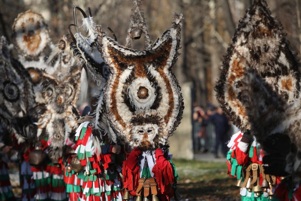 Сурвакари и кукери от Перник дефилираха в София