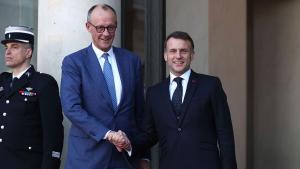 мерц макрон