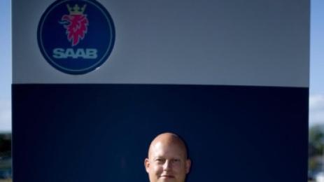 Кристиан фон Кьонигсег пред емблемата на Сааб