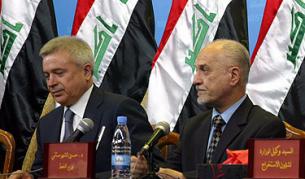 Иракският министър на петрола Хюсеин ал Шахристани и президентът на "Лукойл" Вагит Алекперов по време на церемонията по подписването