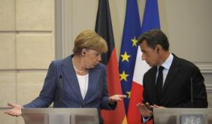 Меркел и Саркози на пресконференцията след срещата на 16 август