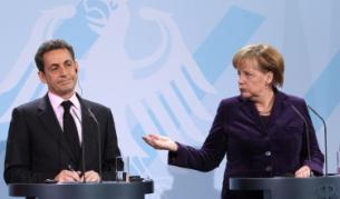 Ангела Меркел и Никола Саркози на съвместната прескоференция след срещата за бъдещето на еврозоната